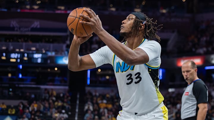 Nov 17, 2024; Indianapolis, Indiana, USA;  Indiana Pacers center Myles Turner (33) shoots the ball in the first quarter against the Miami Heat at Gainbridge Fieldhouse. Mandatory Credit: Trevor Ruszkowski-Imagn Images