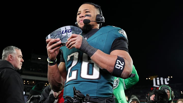 Philadelphia Eagles running back Saquon Barkley (26) celebrates after winning the NFC Championship game against the Washington Commanders at Lincoln Financial Field. Philadelphia Eagles running back Saquon Barkley (26) celebrates after winning the NFC Championship game against the Washington Commanders at Lincoln Financial Field.