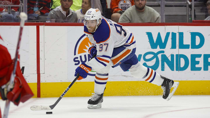 Oct 27, 2024; Detroit, Michigan, USA; Edmonton Oilers center Connor McDavid (97) handles the puck during the third period of the game against the Detroit Red Wings at Little Caesars Arena. Mandatory Credit: Brian Bradshaw Sevald-Imagn Images