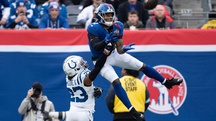 New York Giants wide receiver Malik Nabers (1) catches a pass in the air while being guarded by Indianapolis Colts defensive back Kenny Moore II (23) during a game between New York Giants and Indianapolis Colts at MetLife Stadium on Sunday, Dec. 29, 2024. New York Giants wide receiver Malik Nabers (1) catches a pass in the air while being guarded by Indianapolis Colts defensive back Kenny Moore II (23) during a game between New York Giants and Indianapolis Colts at MetLife Stadium on Sunday, Dec. 29, 2024.