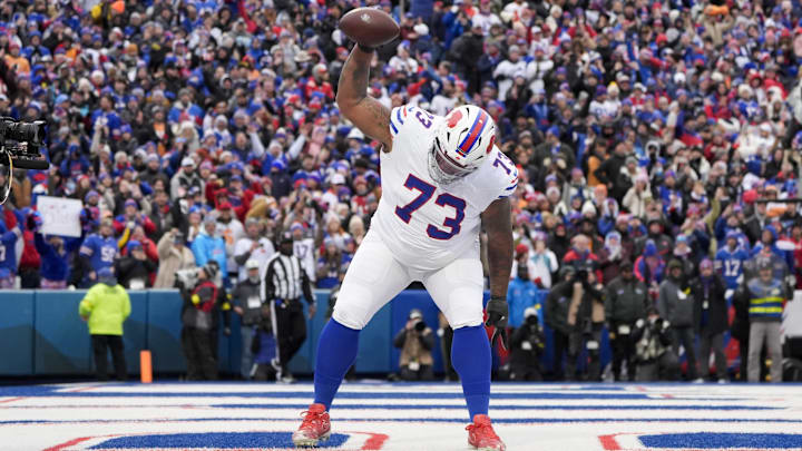 Nov 16, 2025; Orchard Park, New York, USA; Buffalo Bills offensive tackle Dion Dawkins (73) celebrates Josh Allen’s first quarter touchdown Nov 16, 2025; Orchard Park, New York, USA; Buffalo Bills offensive tackle Dion Dawkins (73) celebrates Josh Allen’s first quarter touchdown