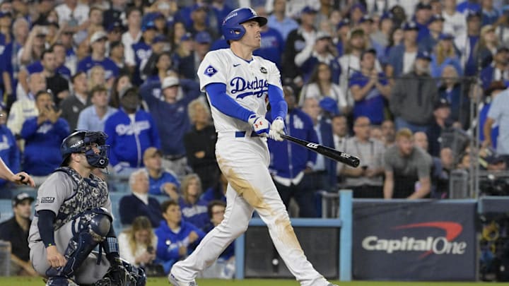 Oct 25, 2024; Los Angeles, California, USA; Los Angeles Dodgers first baseman Freddie Freeman (5) hits a grand slam home run in the tenth inning against the New York Yankees during game one of the 2024 MLB World Series at Dodger Stadium. Mandatory Credit: Jayne Kamin-Oncea-Imagn Images Oct 25, 2024; Los Angeles, California, USA; Los Angeles Dodgers first baseman Freddie Freeman (5) hits a grand slam home run in the tenth inning against the New York Yankees during game one of the 2024 MLB World Series at Dodger Stadium. Mandatory Credit: Jayne Kamin-Oncea-Imagn Images