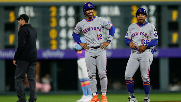 Jun 6, 2025; Denver, Colorado, USA; New York Mets pinch hitter Francisco Lindor (12) reacts from second with first base coach Antoan Richardson (66) on a two RBI double in the ninth inning against the Colorado Rockies at Coors Field. Mandatory Credit: Isaiah J. Downing-Imagn Images Jun 6, 2025; Denver, Colorado, USA; New York Mets pinch hitter Francisco Lindor (12) reacts from second with first base coach Antoan Richardson (66) on a two RBI double in the ninth inning against the Colorado Rockies at Coors Field. Mandatory Credit: Isaiah J. Downing-Imagn Images