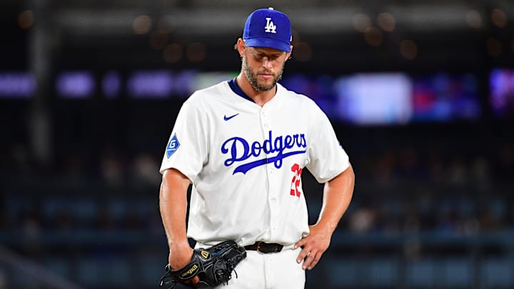 June 3, 2025; Los Angeles, California, USA; Los Angeles Dodgers pitcher Clayton Kershaw (22) reacts during the fifth inning at Dodger Stadium. Mandatory Credit: Gary A. Vasquez-Imagn Images
