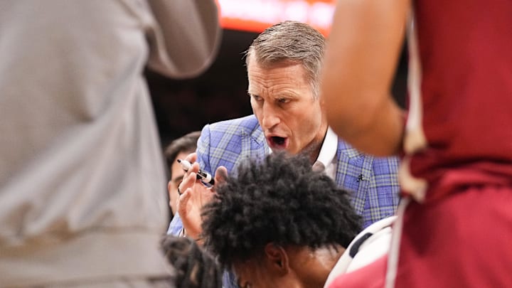 Feb 19, 2025; Columbia, Missouri, USA; Alabama Crimson Tide head coach Nate Oats talks to players in a timeout against the Missouri Tigers during the first half at Mizzou Arena. Mandatory Credit: Denny Medley-Imagn Images