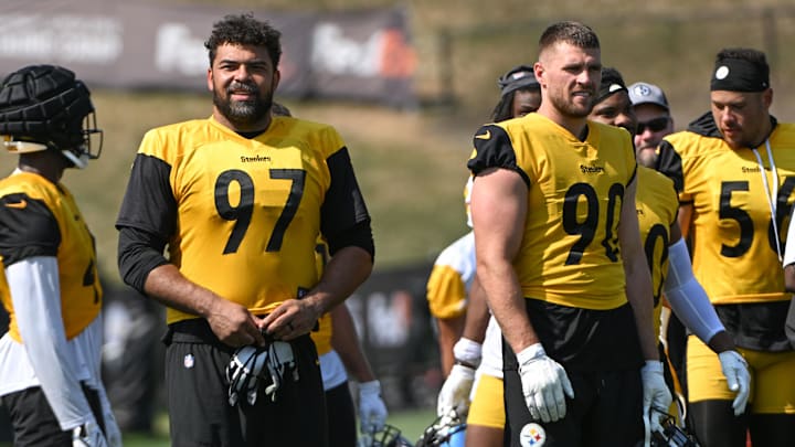 Jul 28, 2024; Latrobe, PA, USA; Pittsburgh Steelers defensive tackle Cameron Heyward (97) and linebacker T.J. Watt (90) participate in drills during training camp at Saint Vincent College. Mandatory Credit: Barry Reeger-Imagn Images