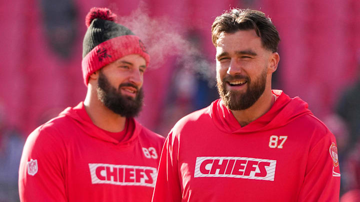Dec 21, 2024; Kansas City, Missouri, USA; Kansas City Chiefs tight end Travis Kelce (87) laughs with tight end Noah Gray (83) during warm ups against the Houston Texans prior to a game at GEHA Field at Arrowhead Stadium. Mandatory Credit: Denny Medley-Imagn Images Dec 21, 2024; Kansas City, Missouri, USA; Kansas City Chiefs tight end Travis Kelce (87) laughs with tight end Noah Gray (83) during warm ups against the Houston Texans prior to a game at GEHA Field at Arrowhead Stadium. Mandatory Credit: Denny Medley-Imagn Images