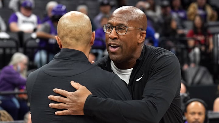 Nov 24, 2024; Sacramento, California, USA; Sacramento Kings head coach Mike Brown (right) and Brooklyn Nets head coach Jordi Fernandez (left) greet each other after the game at Golden 1 Center. Mandatory Credit: Darren Yamashita-Imagn Images