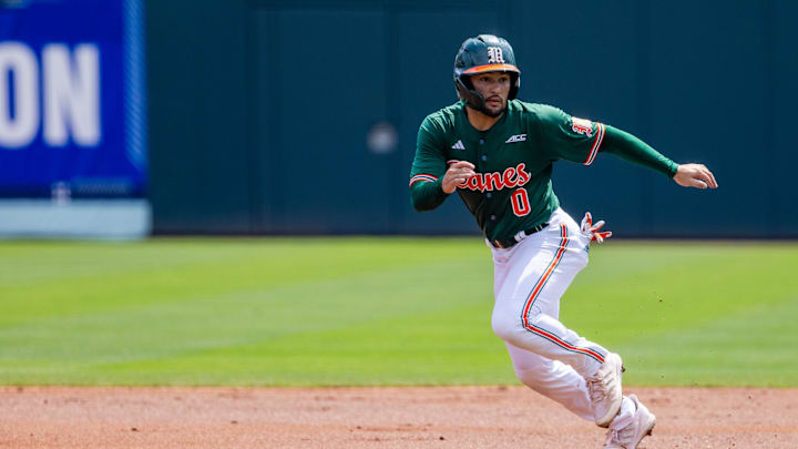 May 23, 2024; Charlotte, NC, USA; Miami (Fl) Hurricanes infielder Dorian Gonzalez Jr. (0) leads off in the second inning against the Clemson Tigers during the ACC Baseball Tournament at Truist Field. Mandatory Credit: Scott Kinser-Imagn Images May 23, 2024; Charlotte, NC, USA; Miami (Fl) Hurricanes infielder Dorian Gonzalez Jr. (0) leads off in the second inning against the Clemson Tigers during the ACC Baseball Tournament at Truist Field. Mandatory Credit: Scott Kinser-Imagn Images