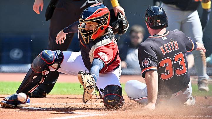 Sep 6, 2026: Detroit Tigers first baseman Colt Keith (33) scores as Cleveland Guardians catcher Patrick Bailey (16) waits for the throw during the first inning at Progressive Field. Credit: Ken Blaze-Imagn Images