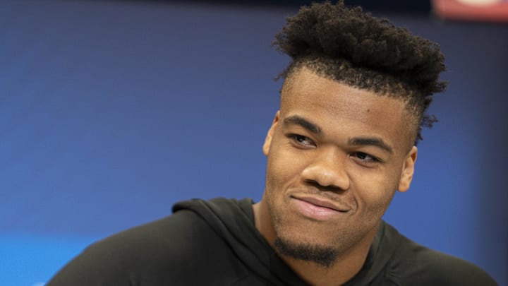 University of Oregon offensive lineman Ajani Cornelius answers questions at a press conference during the 2025 NFL Combine.