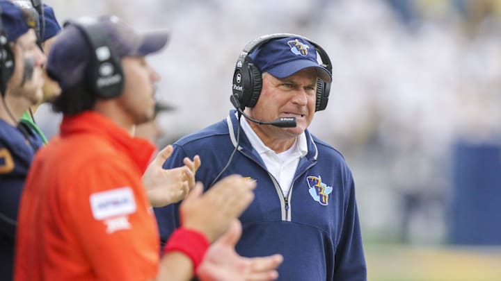 Sep 27, 2025; Morgantown, West Virginia, USA; West Virginia Mountaineers head coach Rich Rodriguez reacts on the sidelines during the third quarter against the Utah Utes at Milan Puskar Stadium. Mandatory Credit: Ben Queen-Imagn Images