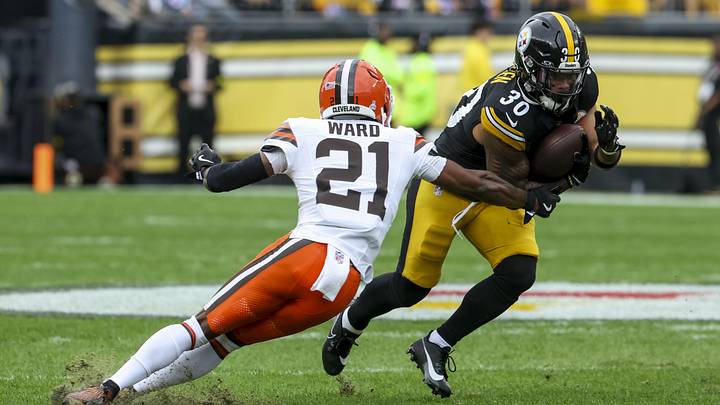 Oct 12, 2025; Pittsburgh, Pennsylvania, USA; Pittsburgh Steelers running back Jaylen Warren (30) runs the ball while Cleveland Browns cornerback Denzel Ward (21) defends during the first quarter at Acrisure Stadium. Mandatory Credit: Charles LeClaire-Imagn Images Oct 12, 2025; Pittsburgh, Pennsylvania, USA; Pittsburgh Steelers running back Jaylen Warren (30) runs the ball while Cleveland Browns cornerback Denzel Ward (21) defends during the first quarter at Acrisure Stadium. Mandatory Credit: Charles LeClaire-Imagn Images