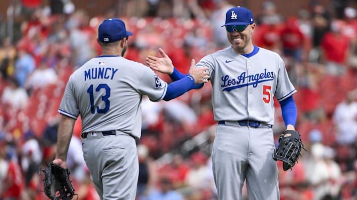 Los Angeles Dodgers first baseman Freddie Freeman (5) celebrates with third baseman Max Muncy (13) after defeating the St. Louis Cardinals at Busch Stadium. 