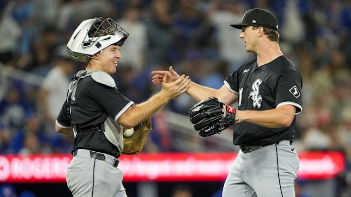 Chicago White Sox pitcher Grant Taylor (31) and catcher Kyle Teel (8) celebrate after defeating the Toronto Blue Jays at Rogers Centre. 