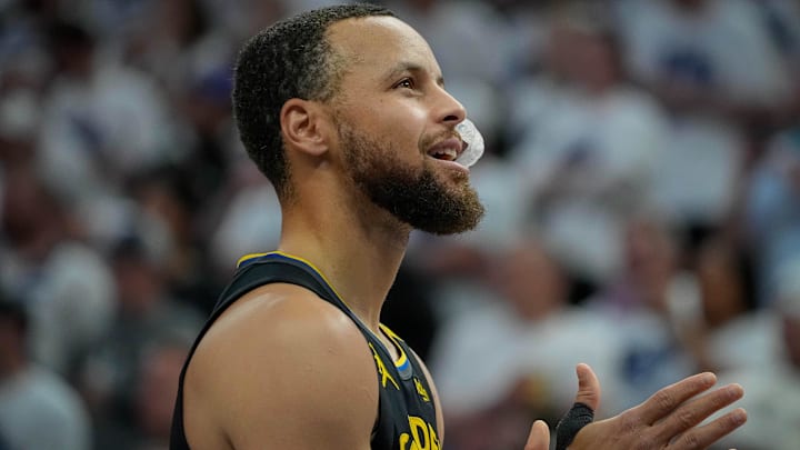 Golden State Warriors guard Stephen Curry (30) prepares to play the Minnesota Timberwolves before game one of the second round for the 2025 NBA Playoffs at Target Center.