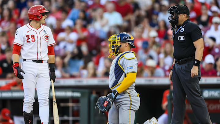 Jun 2, 2025; Cincinnati, Ohio, USA; Cincinnati Reds outfielder TJ Friedl (29) reacts after a strike called in the second inning against the Milwaukee Brewers at Great American Ball Park. Mandatory Credit: Katie Stratman-Imagn Images
