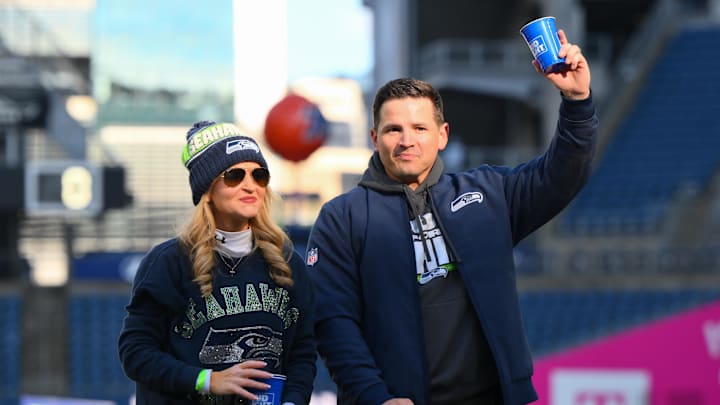 Feb 11, 2026; Seattle, WA, USA; Seattle Seahawks head coach Mike MacDonald and wife Stephanie after the Super Bowl LX trophy presentation at Lumen Field. Feb 11, 2026; Seattle, WA, USA; Seattle Seahawks head coach Mike MacDonald and wife Stephanie after the Super Bowl LX trophy presentation at Lumen Field.