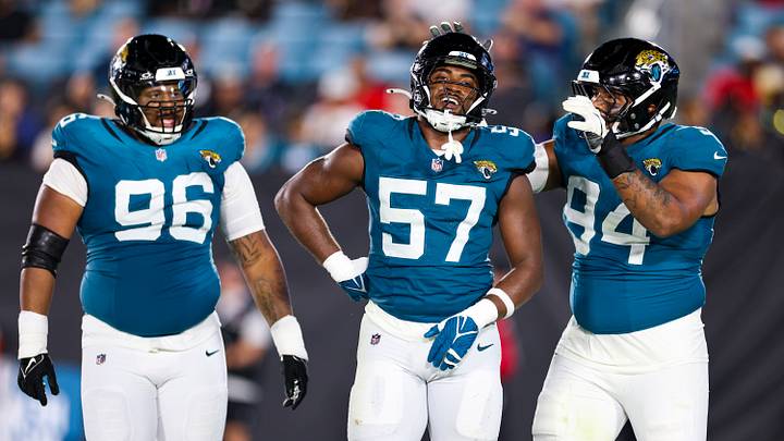 Aug 28, 2026; Jacksonville, Florida, USA; Jacksonville Jaguars defensive end Bryan Thomas Jr. (57) reacts with tight end Hunter Long (84) and defensive tackle Jalen Hunt (96) after a sack against the Tampa Bay Buccaneers in the third quarter during preseason at EverBank Stadium. Mandatory Credit: Nathan Ray Seebeck-Imagn Images