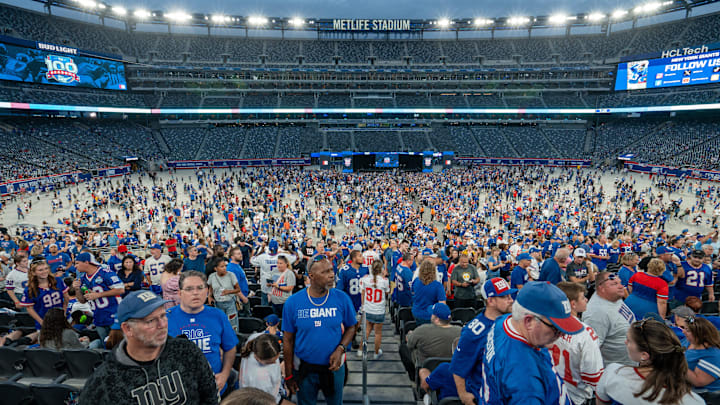 Fans find their seats in the stands and on the field during the Giants Fan Fest, celebrating 100 seasons, at MetLife Stadium on Friday, Sept. 6, 2024. Fans find their seats in the stands and on the field during the Giants Fan Fest, celebrating 100 seasons, at MetLife Stadium on Friday, Sept. 6, 2024.