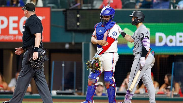 Jul 22, 2026: Chicago White Sox catcher Edgar Quero (26) checks on Texas Rangers catcher Elias Díaz (35) after fouling off a pitch during the ninth inning at Globe Life Field. Credit: Andrew Dieb-Imagn Images