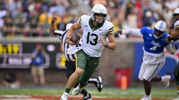 Sep 6, 2025; Dallas, Texas, USA; Baylor Bears quarterback Sawyer Robertson (13) runs with the ball during the second half against the SMU Mustangs at Gerald J. Ford Stadium. Mandatory Credit: Jerome Miron-Imagn Images