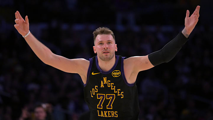 Jan 2, 2026; Los Angeles, California, USA; Los Angeles Lakers guard Luka Doncic (77) reacts after a 3-point basket in the second half against the Memphis Grizzlies at Crypto.com Arena. Mandatory Credit: Jayne Kamin-Oncea-Imagn Images