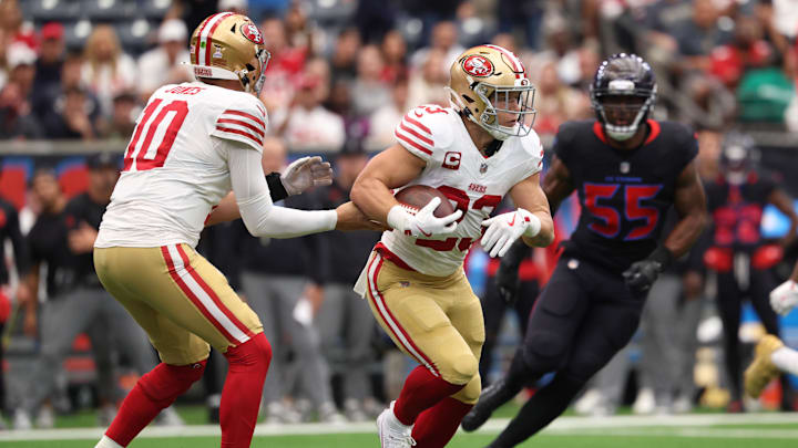 Oct 26, 2025; Houston, Texas, USA; San Francisco 49ers running back Christian McCaffrey (23) runs after a handoff from San Francisco 49ers quarterback Mac Jones (10) during the first quarter against the Houston Texans at NRG Stadium. Mandatory Credit: Troy Taormina-Imagn Images Oct 26, 2025; Houston, Texas, USA; San Francisco 49ers running back Christian McCaffrey (23) runs after a handoff from San Francisco 49ers quarterback Mac Jones (10) during the first quarter against the Houston Texans at NRG Stadium. Mandatory Credit: Troy Taormina-Imagn Images