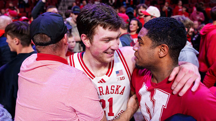 Nebraska forward Pryce Sandfort celebrates with fans after the Huskers' win Friday night over No. 9 Michigan State at Pinnacle Bank Arena.