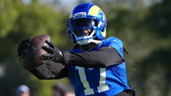 Los Angeles Rams receiver Davante Adams (17) catches the ball during training camp at Loyola Marymount University. Los Angeles Rams receiver Davante Adams (17) catches the ball during training camp at Loyola Marymount University.