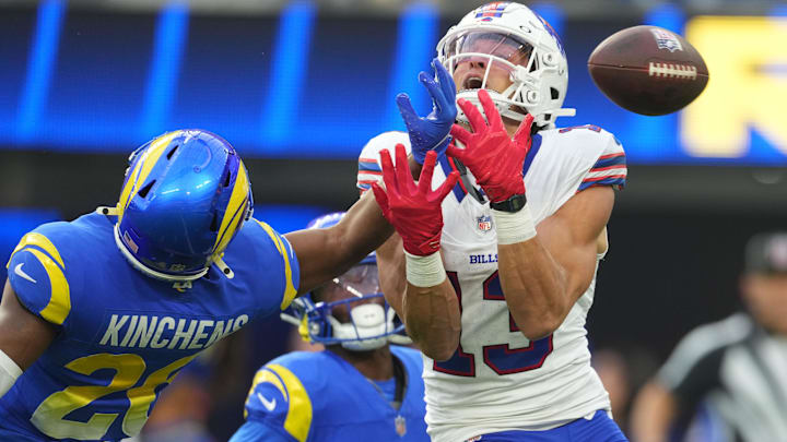 Dec 8, 2024; Inglewood, California, USA; Buffalo Bills wide receiver Mack Hollins (13) attempts to catch the ball against Los Angeles Rams safety Kamren Kinchens (26) in the first half at SoFi Stadium. Mandatory Credit: Kirby Lee-Imagn Images