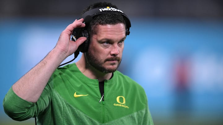 Dec 28, 2022; San Diego, CA, USA; Oregon Ducks head coach Dan Lanning looks on from the sideline during the second half against the North Carolina Tar Heels of the 2022 Holiday Bowl at Petco Park. Mandatory Credit: Orlando Ramirez-Imagn Images