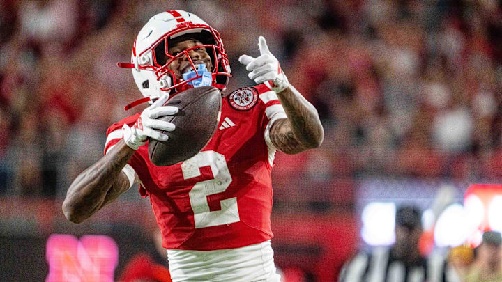 Sep 6, 2025; Lincoln, Nebraska, USA; Nebraska Cornhuskers wide receiver Jacory Barney Jr. (2) celebrates after a catch against the Akron Zips during the third quarter at Memorial Stadium. Mandatory Credit: Dylan Widger-Imagn Images
