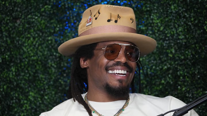 Feb 7, 2025; New Orleans, LA, USA; Cam Newton on Radio Row at the Super Bowl LIX media center. Mandatory Credit: Kirby Lee-Imagn Images