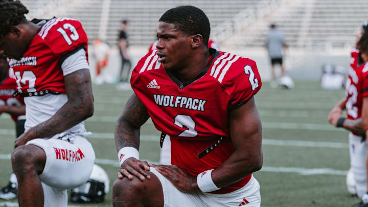 NC State WR Joshisa "JoJo" Trader stretches during a practice with the Wolfpack during the spring term. 