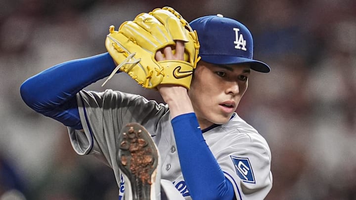 May 3, 2025; Cumberland, Georgia, USA; Los Angeles Dodgers starting pitcher Roki Sasaki (11) pitches against the Atlanta Braves during the first inning at Truist Park. Mandatory Credit: Dale Zanine-Imagn Images