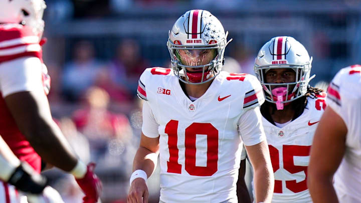 Ohio State Buckeyes quarterback Julian Sayin (10) prepares to put the ball in play during the game against the Wisconsin Badgers at Camp Randall Stadium on Saturday, Oct. 18, 2025 in Madison, Wisconsin. Ohio State Buckeyes quarterback Julian Sayin (10) prepares to put the ball in play during the game against the Wisconsin Badgers at Camp Randall Stadium on Saturday, Oct. 18, 2025 in Madison, Wisconsin.