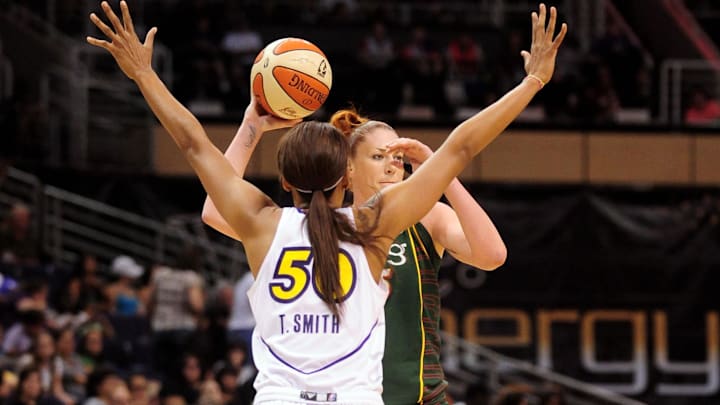 Aug 20, 2010; Phoenix, AZ, USA; Seattle Storm forward Lauren Jackson handles the ball against Phoenix Mercury forward Tangela Smith during the second half at US Airways Center.  The Storm defeated the Mercury 78-73.  Mandatory Credit: Jennifer Stewart-Imagn Images