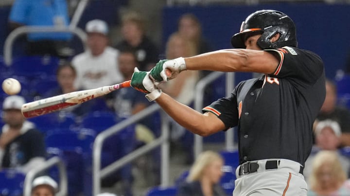 Miami Third baseman Daniel Cuvet against FIU smashing a grand slam in loanDepot Park