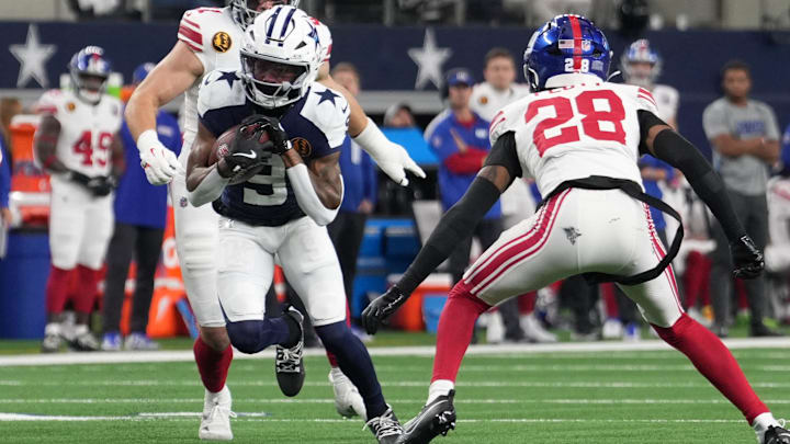 Dallas Cowboys wide receiver KaVontae Turpin catches a pass as New York Giants cornerback Cor'Dale Flott.