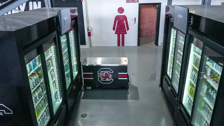 Reporters tour the refurbished areas including beer concessions, and added women’s restrooms, during the South Carolina football's Williams-Brice Stadium tour Wednesday, Sept. 2, 2026 in Columbia, S.C. Greg Hughes, Contract Construction Chief Executive Officer said there were 7.5 times more bathrooms for women added in the first of three phase renovations.