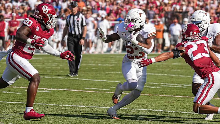 Texas Longhorns running back Jaydon Blue (23) runs the ball during the Red River Rivalry game against Oklahoma at the Cotton Bowl on Saturday, Oct. 12, 2024 in Dallas, Texas.