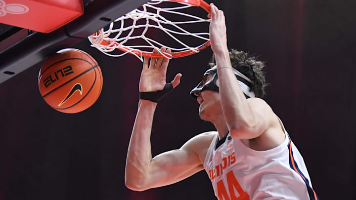 Jan 17, 2026; Champaign, Illinois, USA;  Illinois Fighting Illini forward Zvonimir Ivisic (44) dunks the ball during the first half against the Minnesota Golden Gophers at State Farm Center. Mandatory Credit: Ron Johnson-Imagn Images