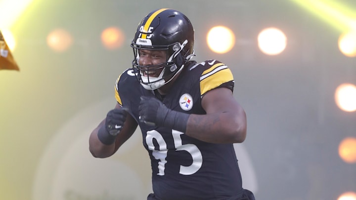 Dec 23, 2023; Pittsburgh, Pennsylvania, USA;  Pittsburgh Steelers defensive tackle Keeanu Benton (95) reacts as he takes the field against the Cincinnati Bengals at Acrisure Stadium. Mandatory Credit: Charles LeClaire-Imagn Images