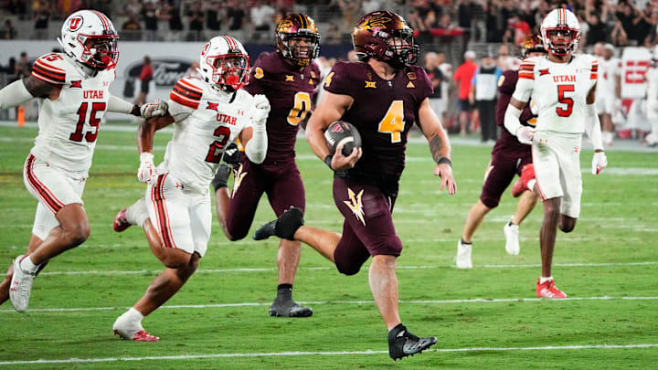 Arizona State Sun Devils running back Cam Skattebo (4) runs for a touchdown against the Utah Utes in the fourth quarter at Mountain America Stadium.