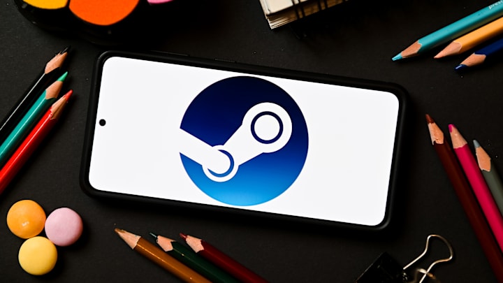 In this photo illustration a Steam logo seen displayed on a...