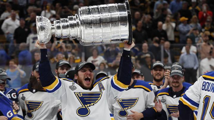 Jun 12, 2019; Boston, MA, USA; St. Louis Blues left wing Alexander Steen (20) hoists the Stanley Cup after defeating the Boston Bruins in game seven of the 2019 Stanley Cup Final at TD Garden. Mandatory Credit: Winslow Townson-Imagn Images