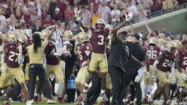 Aug 30, 2025; Tallahassee, Florida, USA; Florida State Seminoles running back Kam Davis (3) and associate head coach Odell Haggins react after a play Alabama Crimson Tide during the second half at Doak S. Campbell Stadium. Mandatory Credit: Melina Myers-Imagn Images Aug 30, 2025; Tallahassee, Florida, USA; Florida State Seminoles running back Kam Davis (3) and associate head coach Odell Haggins react after a play Alabama Crimson Tide during the second half at Doak S. Campbell Stadium. Mandatory Credit: Melina Myers-Imagn Images