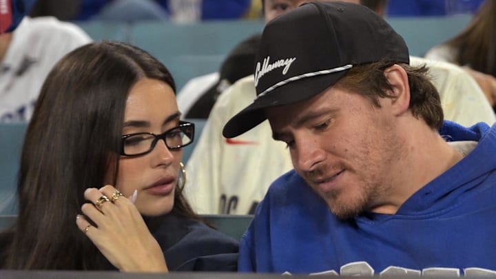 Los Angeles Chargers quarterback Justin Herbert and girlfriend Madison Beer attend game three of the 2025 MLB World Series between the Toronto Blue Jays and the Los Angeles Dodgers at Dodger Stadium.
