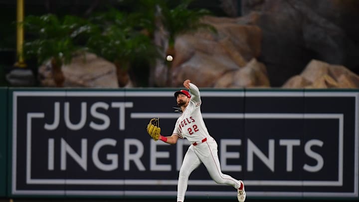 Aug 2, 2025; Anaheim, California, USA; Los Angeles Angels center fielder Bryce Teodosio (22) throws after fielding the single of Chicago White Sox third baseman Brooks Baldwin (27) during the seventh inning at Angel Stadium. Mandatory Credit: Gary A. Vasquez-Imagn Images